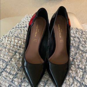 Black patent with red heart pumps.